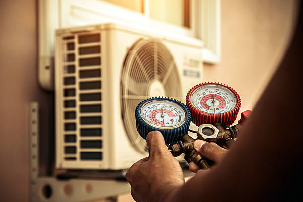 Professional Heat Pump Repair technician working in Belmont, WI